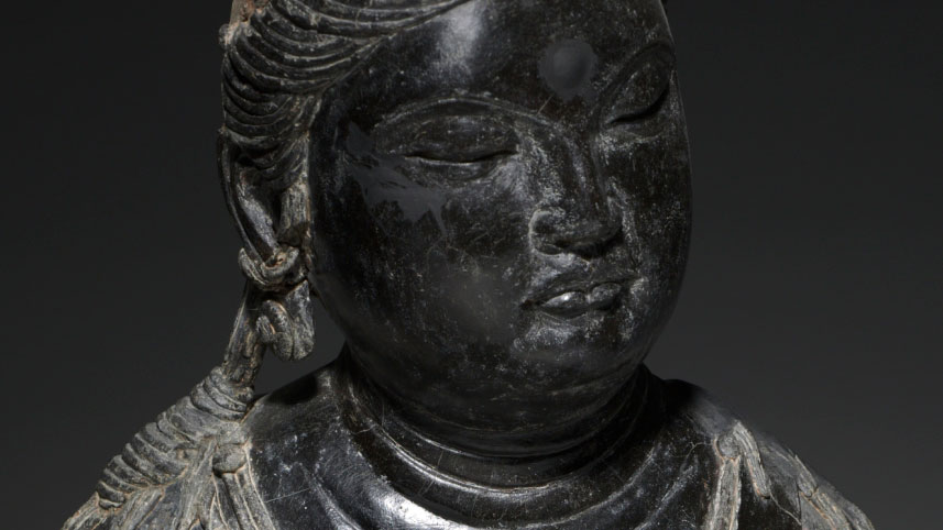 detail, face of an Attendant bodhisattva sculpture