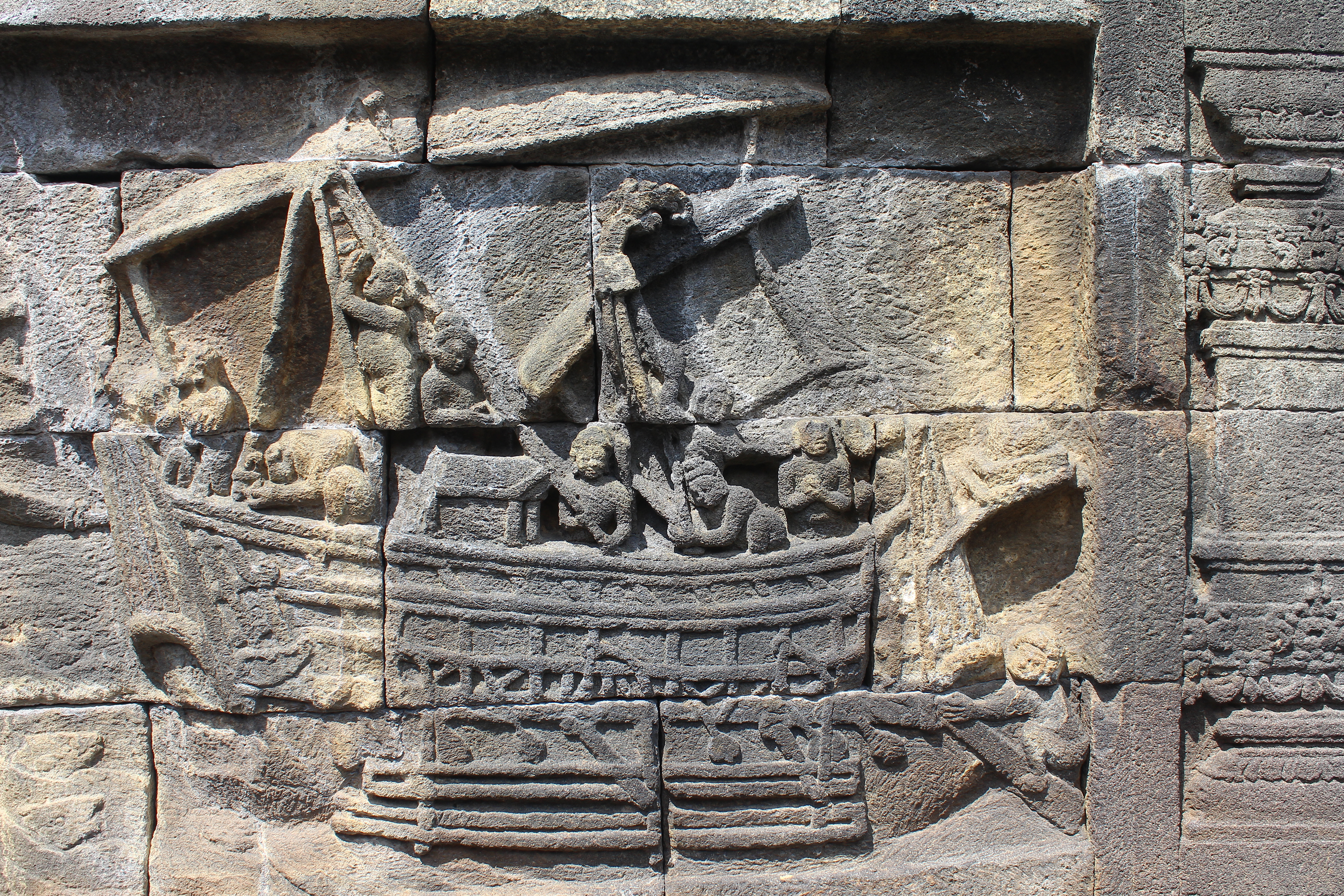 Relief carving depicting a boat with figures in it