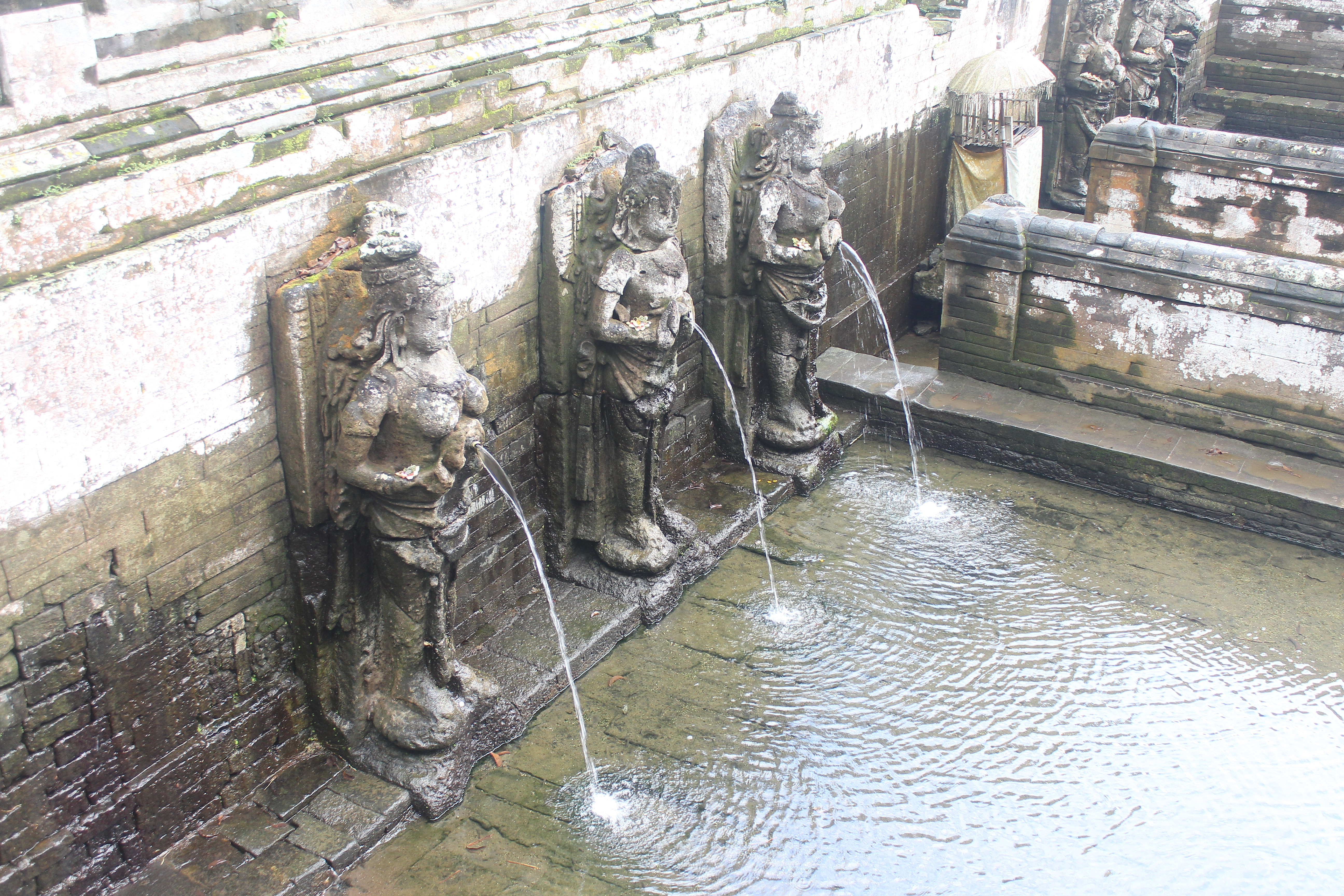 Bathing pool with sculptures of goddesses pouring water from pots