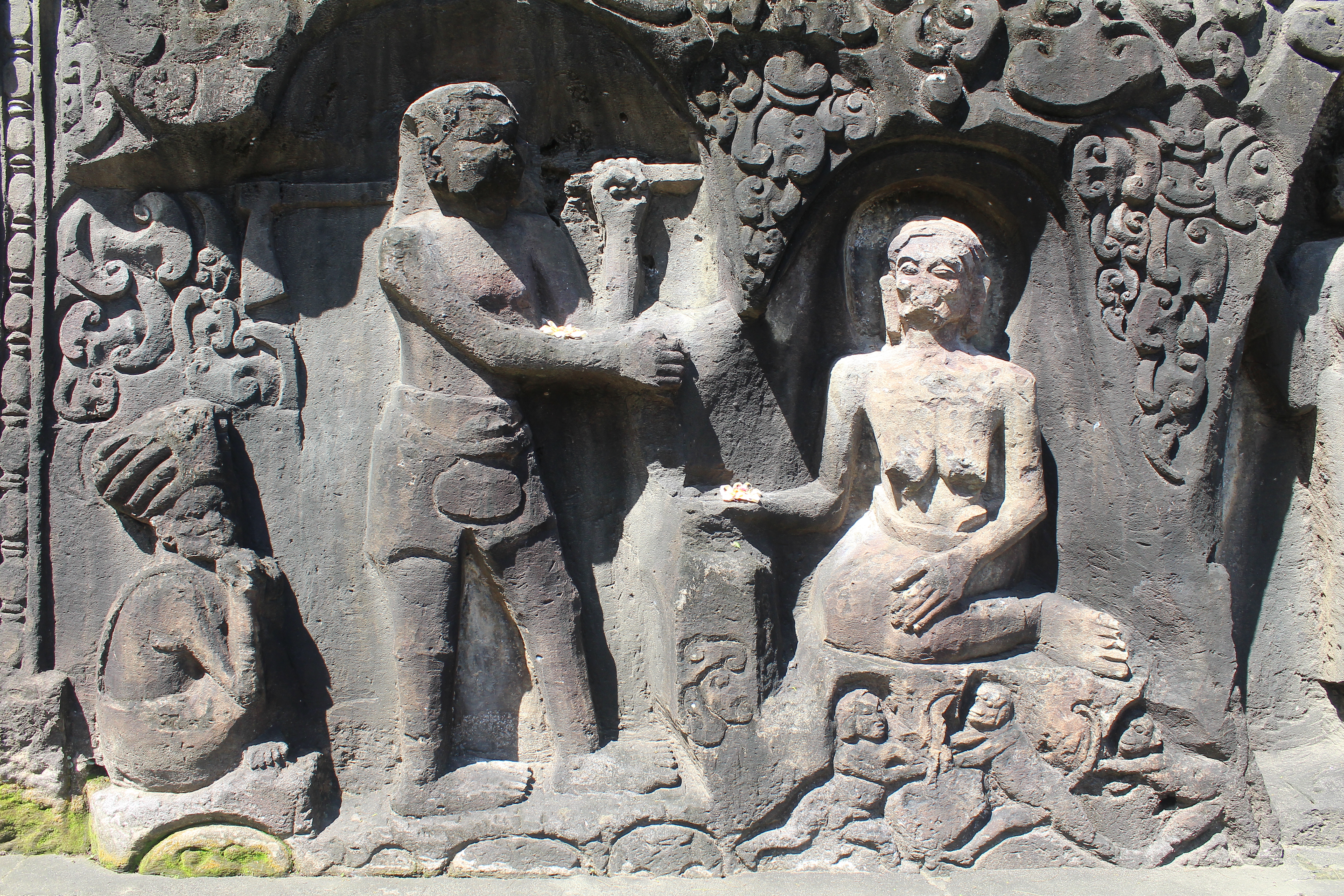 Relief showing man visiting an ascetic woman in a cave