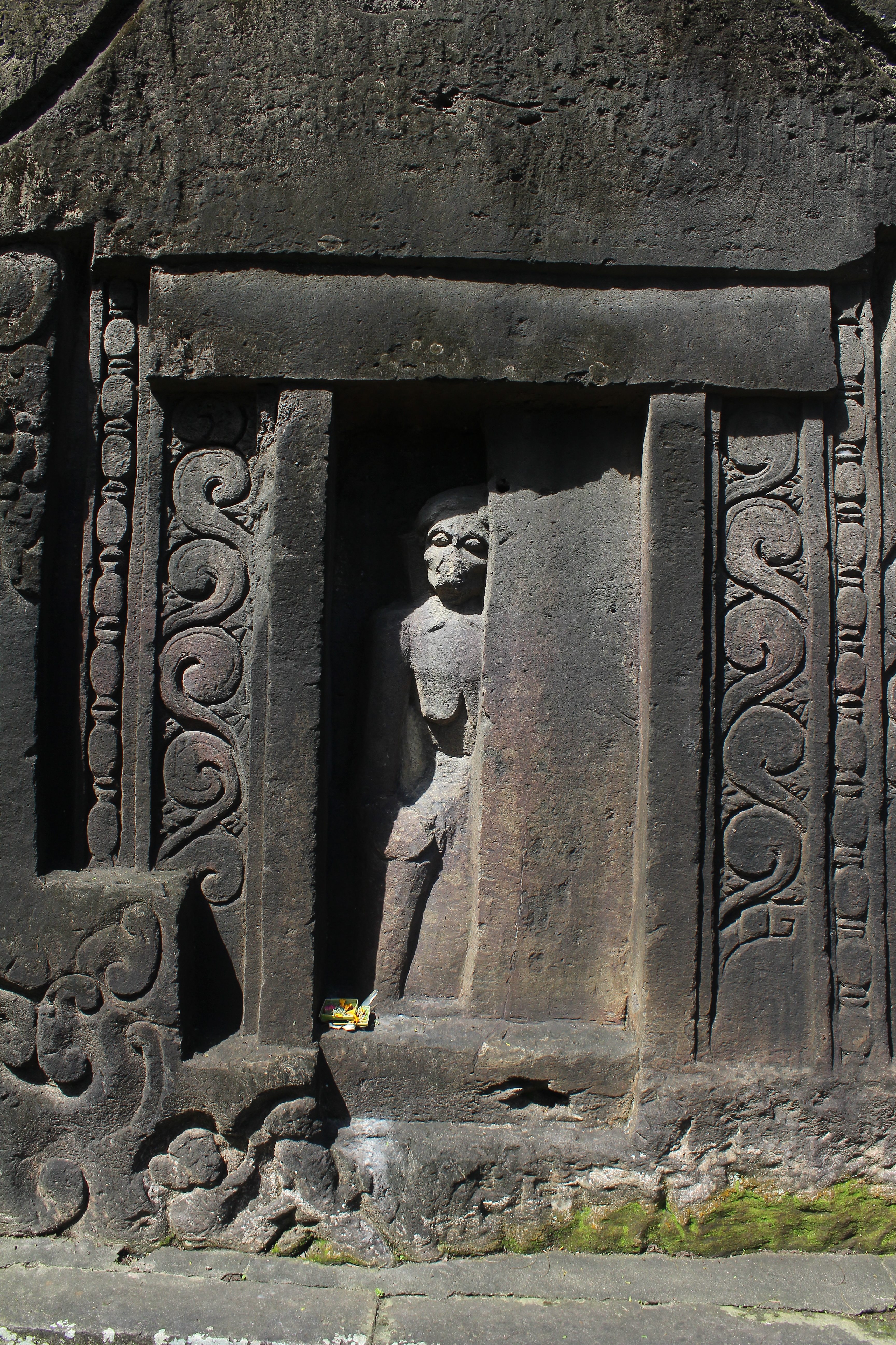 Relief showing figure through half door