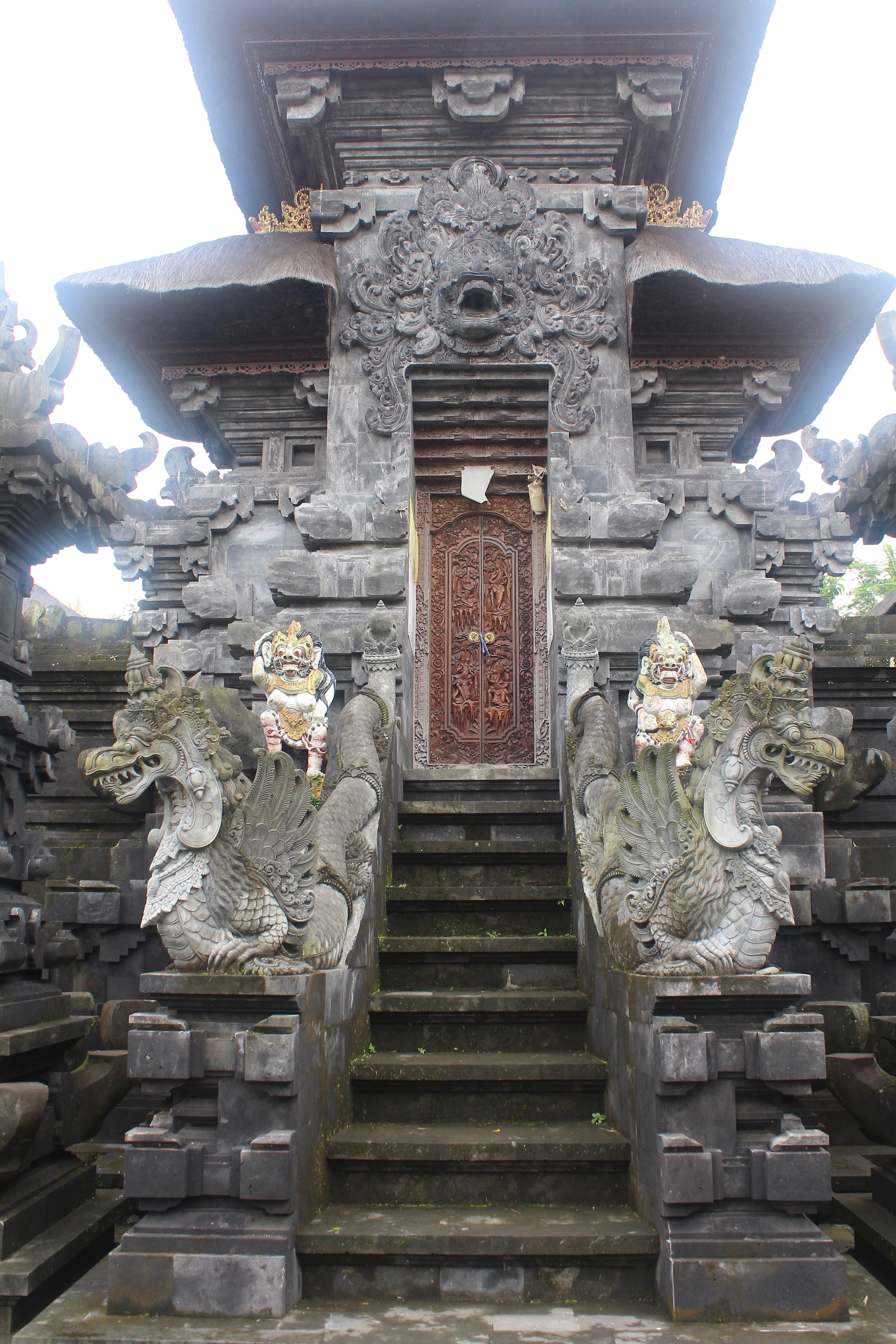 Shrine entrance flanked by serpent sculptures